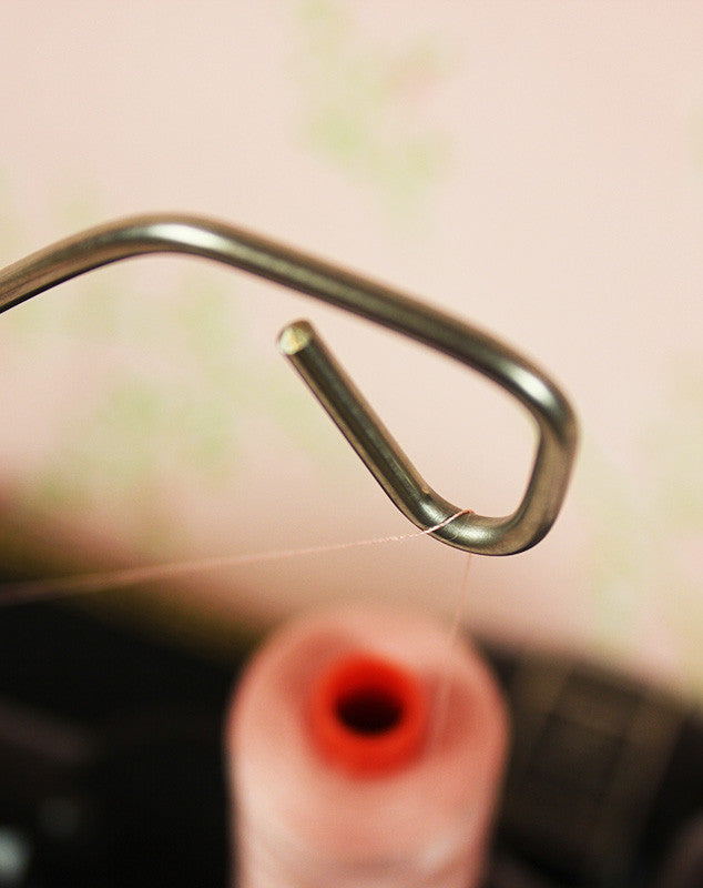 The Importance of a Thread Stand on a Singer Featherweight