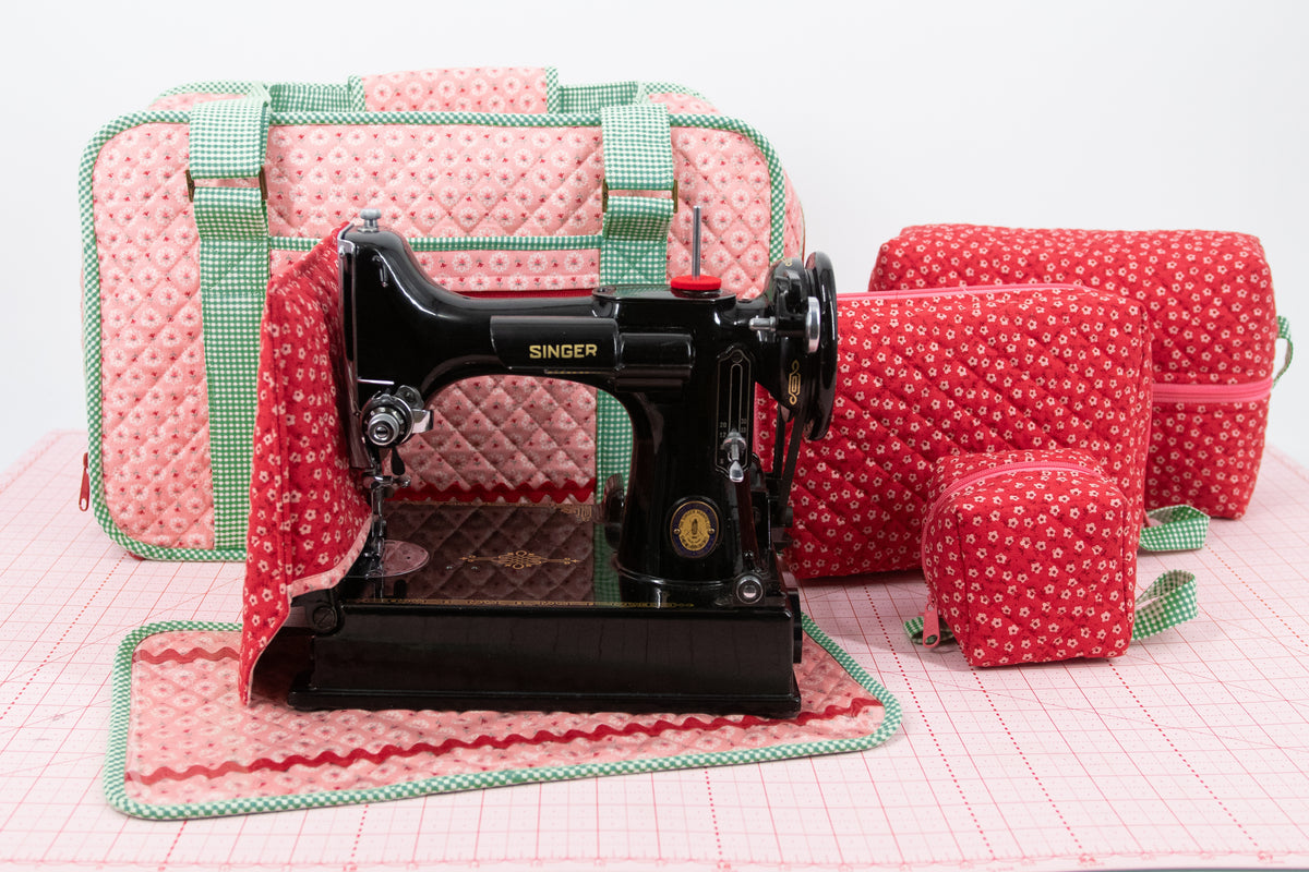 Stitcher's Suitcase and Feathered Friends organizers sewn in Berry & Sage fabric