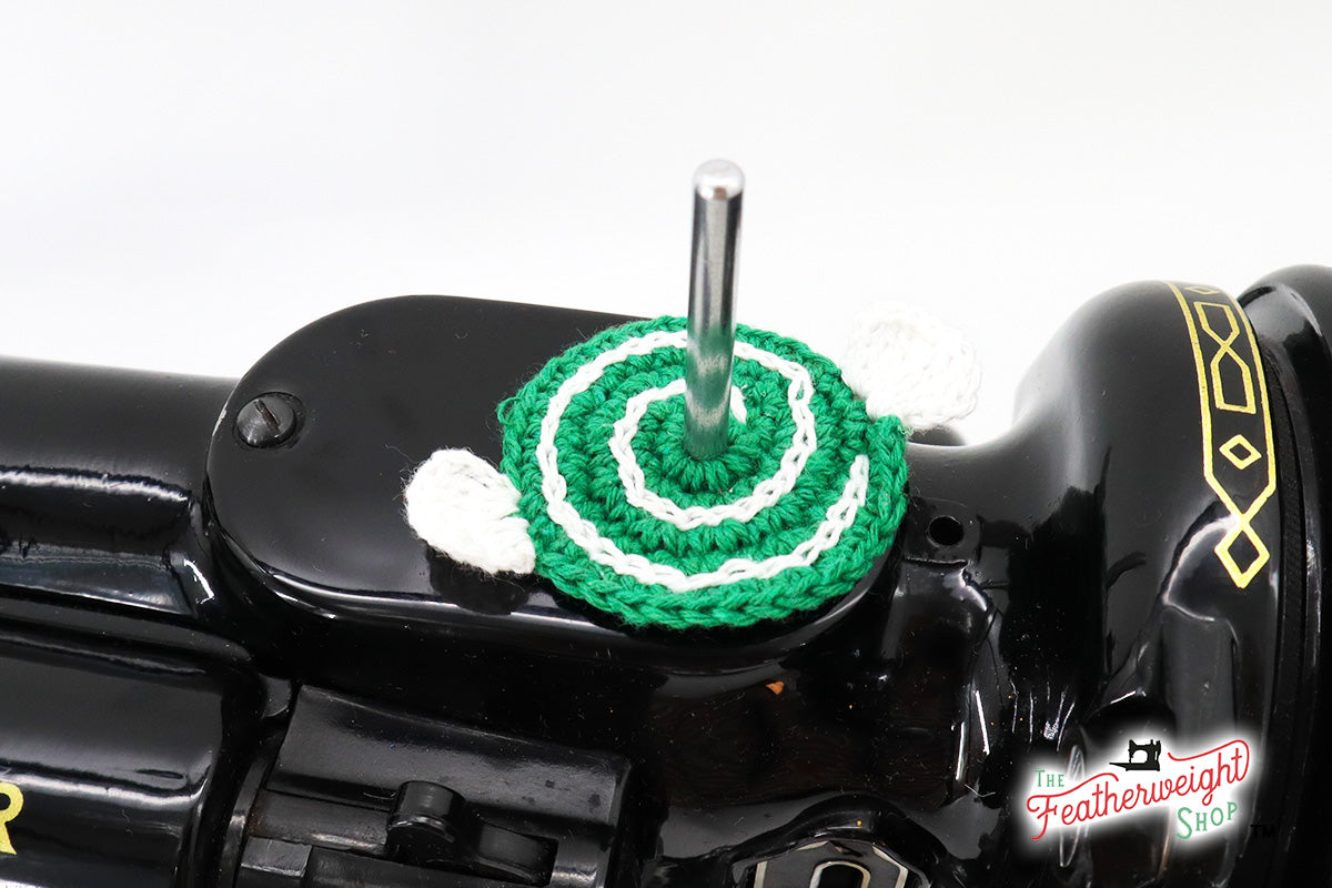 Peppermint Green spool pin doily shown on the machine