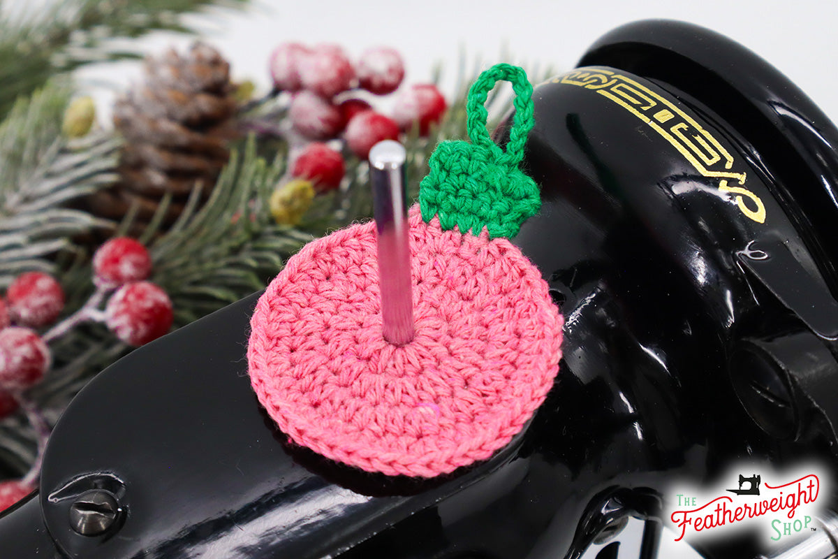 Christmas Ball Ornament spool pin doily shown on the machine
