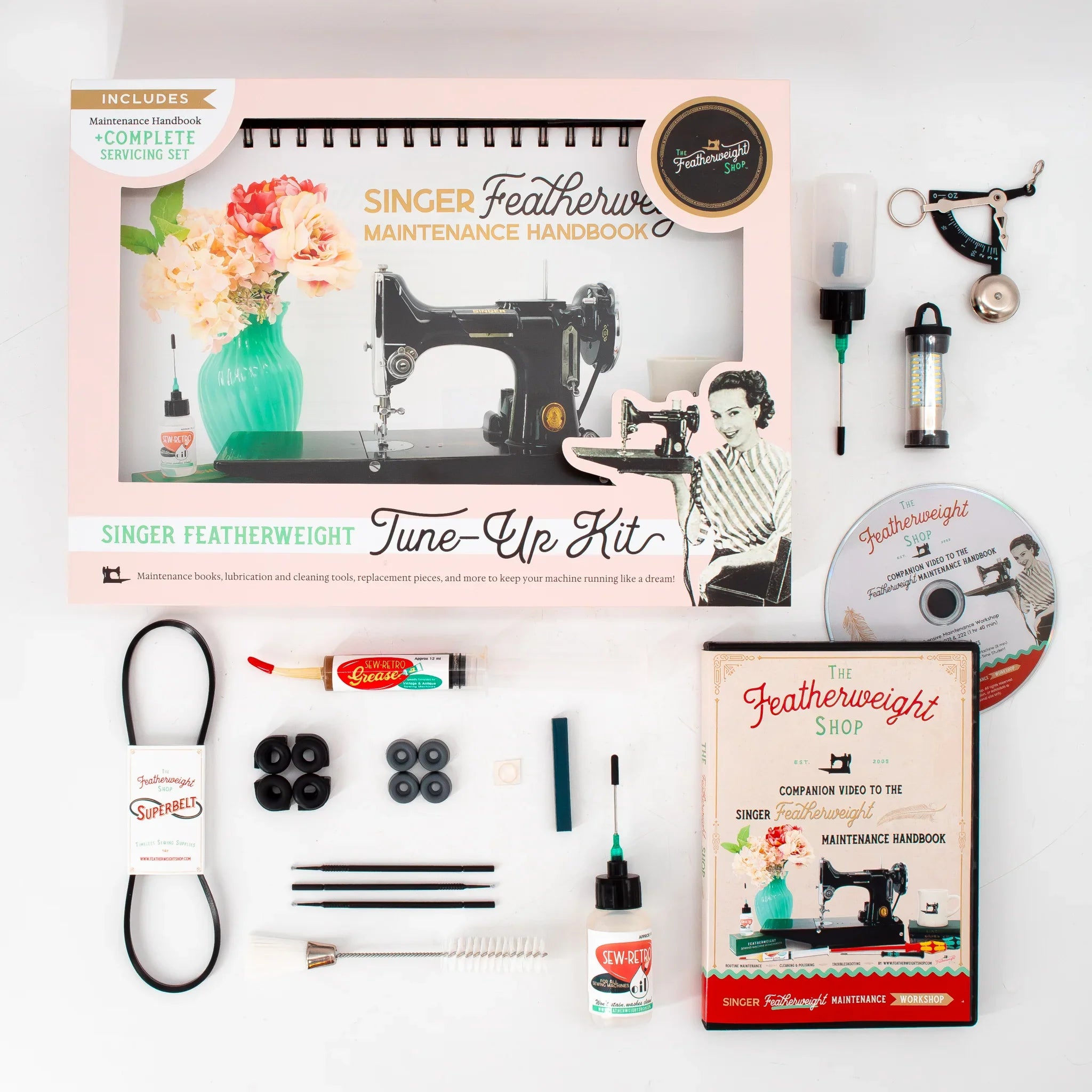 Everything inside the Tune-Up Kit — handbook, Workshop DVD, and all 16 tools laid out
