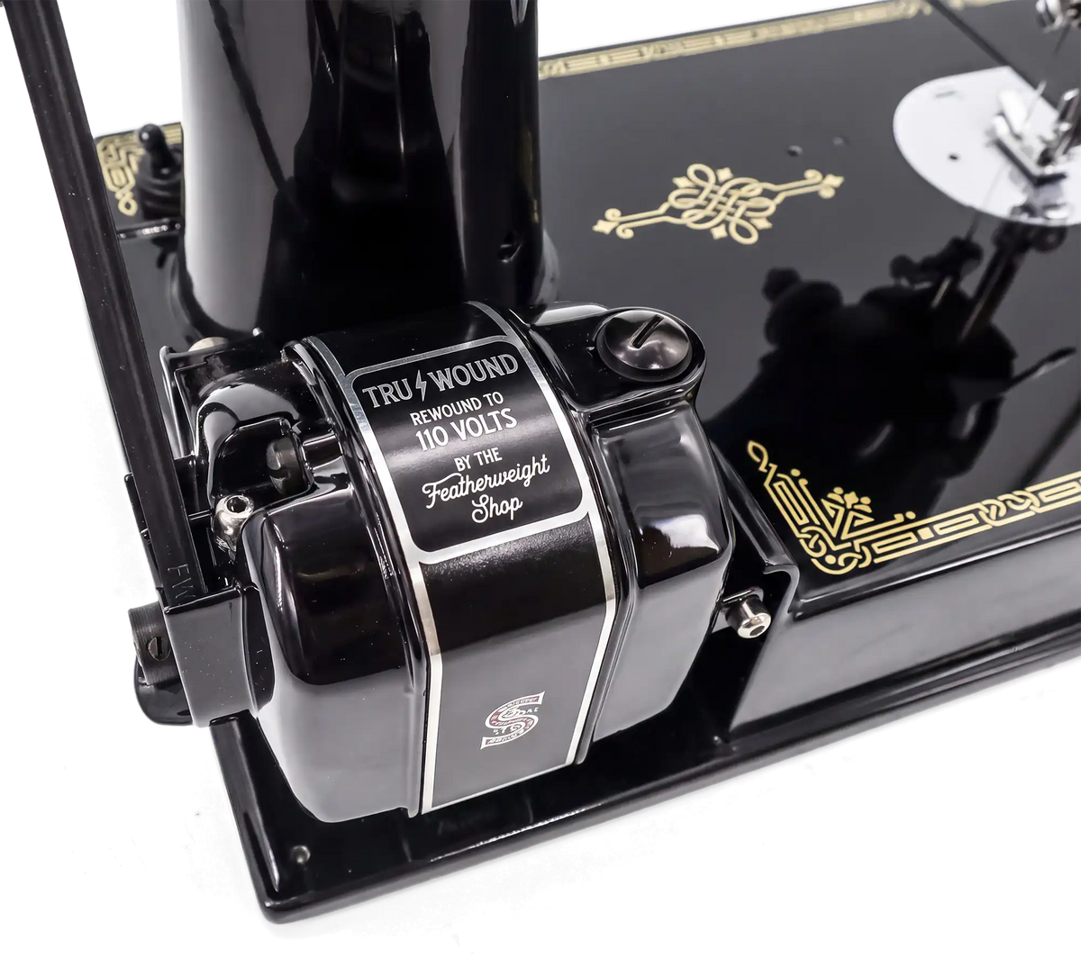 A Tru-Wound motor installed on a Featherweight, its Tru-Wound label facing out