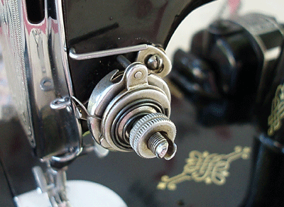 Upper Tension Take-Up Spring