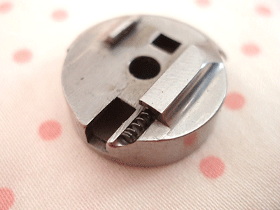 spring in the bobbin case