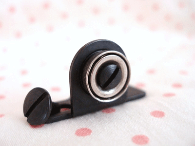 bobbin winder tension bracket