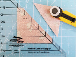 Load image into Gallery viewer, cutting with the corner clipper ruler