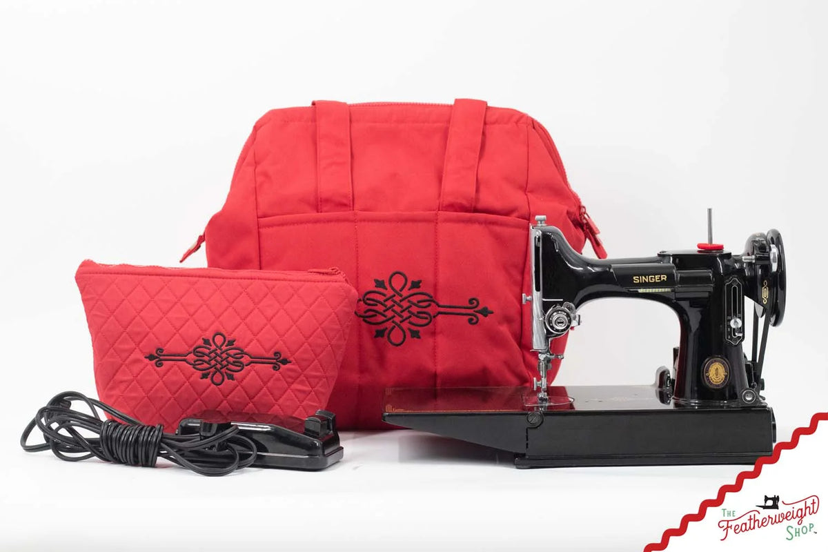 Featherweight Shop red padded travel bag with Singer Featherweight