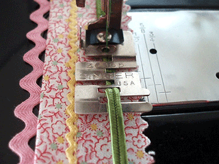 Load image into Gallery viewer, applying piping with the edge stitcher