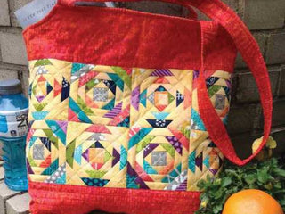 Load image into Gallery viewer, bag made using the creative grids pineapple ruler