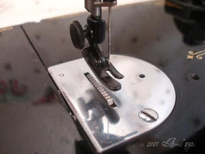 The 1939 Singer Featherweight 221 and the Penguin Walking Presser Foot