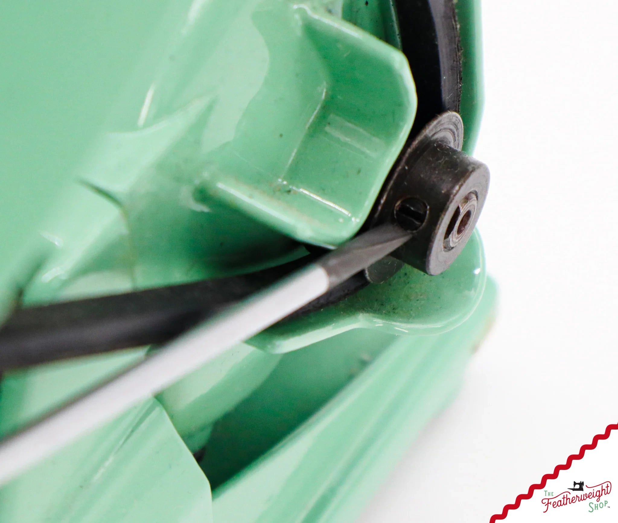 A Wera maintenance screwdriver seated square in a screw on a Featherweight