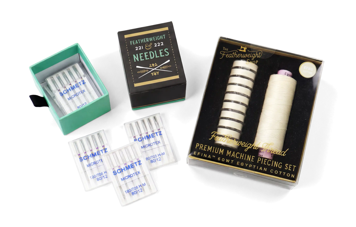 The Thread and Needles Bundle: the Featherweight needle box with its five Schmetz Chrome Microtex packs and the Premium Machine Piecing Set